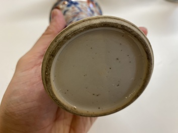 A Chinese grisaille garniture of five 'phoenix' vases, Kangxi/Yongzheng
