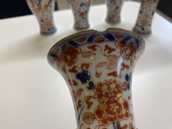A Chinese grisaille garniture of five 'phoenix' vases, Kangxi/Yongzheng