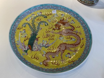 A Chinese yellow-ground famille rose 'dragon and phoenix' dish, Qianlong mark, 19/20th C.