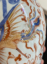 A Chinese grisaille garniture of five 'phoenix' vases, Kangxi/Yongzheng
