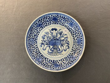 A Chinese blue and white Ming-style 'flower bouquet' dish, Qianlong