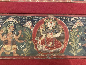 Eight tsaklis and three painted wood book covers, Tibet, 19th C.