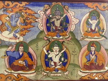 Eight tsaklis and three painted wood book covers, Tibet, 19th C.