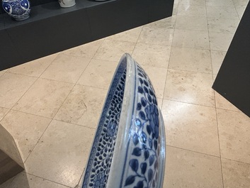 A Chinese blue and white Ming-style 'flower bouquet' dish, Qianlong