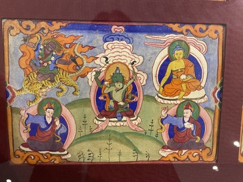 Eight tsaklis and three painted wood book covers, Tibet, 19th C.
