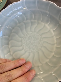 A Chinese sang-de-boeuf-glazed jar, a blanc de Chine Buddha and two plates, 19th C.