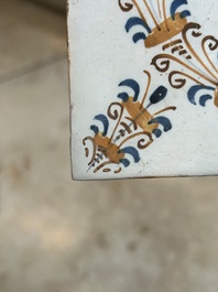 Four polychrome Dutch Delft tiles with animals in aigrette medallions, Haarlem, 17th C.