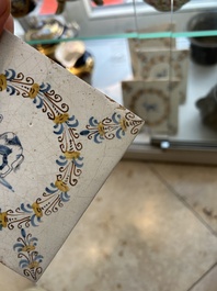Four polychrome Dutch Delft tiles with animals in aigrette medallions, Haarlem, 17th C.