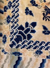 A large Chinese Ningxia rug with dragons on a yellow ground, Tai He Tian 太和殿 mark, 19th C.