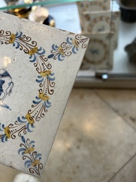 Four polychrome Dutch Delft tiles with animals in aigrette medallions, Haarlem, 17th C.