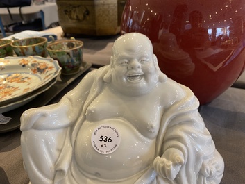 A Chinese sang-de-boeuf-glazed jar, a blanc de Chine Buddha and two plates, 19th C.
