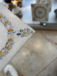 Four polychrome Dutch Delft tiles with animals in aigrette medallions, Haarlem, 17th C.