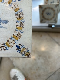 Four polychrome Dutch Delft tiles with animals in aigrette medallions, Haarlem, 17th C.