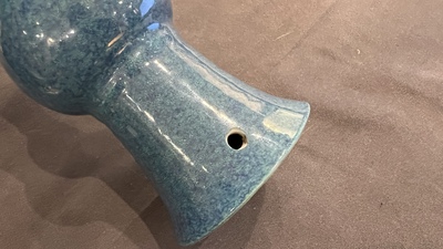 Two Japanese flamb&eacute;-glazed Awaji bottle vases and a Chinese robin's egg-glazed vase, 19/20th C.