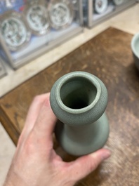 A Chinese celadon-glazed bottle vase and two bowls, Yuan/Ming