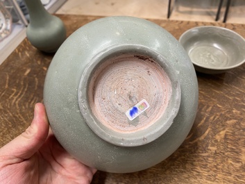 A Chinese celadon-glazed bottle vase and two bowls, Yuan/Ming