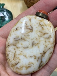 15 Chinese hardstone, glass and walnut snuff bottles, 19/20th C.