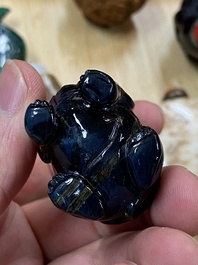 15 Chinese hardstone, glass and walnut snuff bottles, 19/20th C.