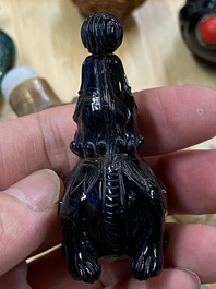 15 Chinese hardstone, glass and walnut snuff bottles, 19/20th C.