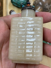 15 Chinese hardstone, glass and walnut snuff bottles, 19/20th C.