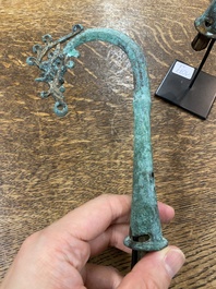 A pair of Chinese bronze finials, Warring States Period, 5th/3rd C. b.C.