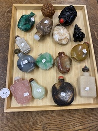 15 Chinese hardstone, glass and walnut snuff bottles, 19/20th C.