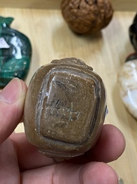 15 Chinese hardstone, glass and walnut snuff bottles, 19/20th C.
