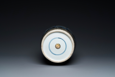 Een Chinese blauw-witte en koperrode rouleau 'Sanxing' vaas, Kangxi