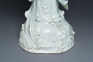 Two exceptionally tall Chinese white-glazed sculptures of Luohan, Qianlong/Jiaqing