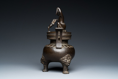 A Chinese bronze tripod censer with Liu Hai and the toad, Yuan