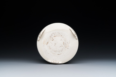 A Chinese Dehua blanc de Chine tripod censer, Kangxi