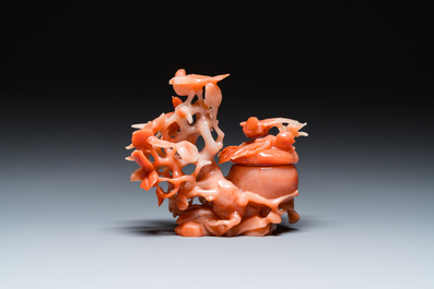A Chinese carnelian agate sculpture of a vase with branches and birds, 20th C.