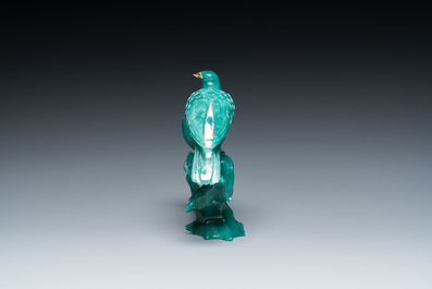 A Chinese emerald green jadeite 'birds' group and a goldstone sculpture of Buddha, 19/20th C.