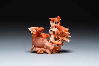 A Chinese carnelian agate sculpture of a vase with branches and birds, 20th C.