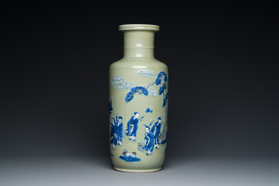 A Chinese celadon-ground blue, white and copper-red rouleau vase, Kangxi