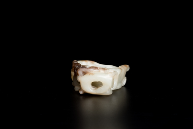A Chinese white and russet jade lotus-form brush washer, Qing