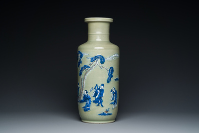 A Chinese celadon-ground blue, white and copper-red rouleau vase, Kangxi