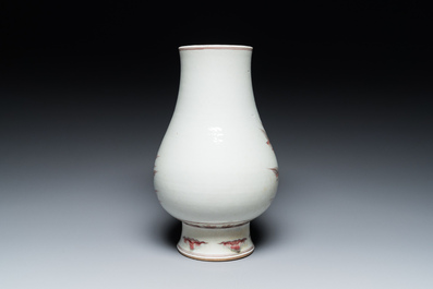 A Chinese copper-red 'dragon and carp' vase, Kangxi mark, 20th C.