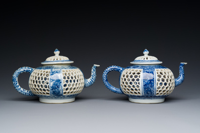 A pair of Chinese reticulated and double-walled blue and white teapots, Transitional period
