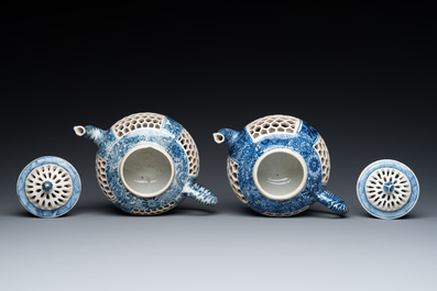 A pair of Chinese reticulated and double-walled blue and white teapots, Transitional period