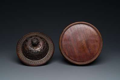 A Chinese famille verte vase with reticulated wooden cover and stand, Kangxi