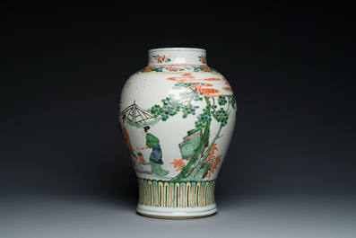 A Chinese famille verte vase with reticulated wooden cover and stand, Kangxi