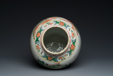 A Chinese famille verte vase with reticulated wooden cover and stand, Kangxi