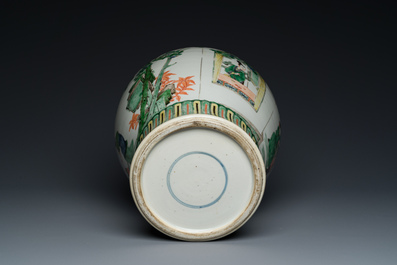 A Chinese famille verte vase with reticulated wooden cover and stand, Kangxi
