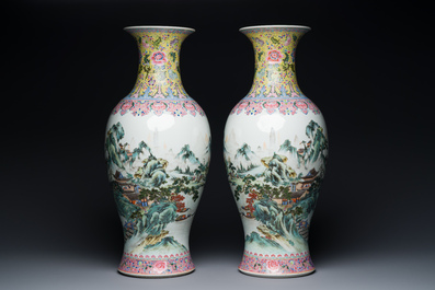 A pair of fine Chinese famille rose 'landscape' vases, Qianlong mark, 20th C.