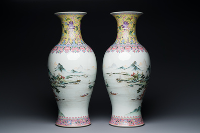 A pair of fine Chinese famille rose 'landscape' vases, Qianlong mark, 20th C.
