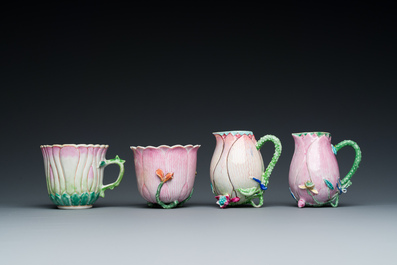 Two Chinese relief-decorated famille rose 'lotus' cups and saucers and two jugs, Yongzheng