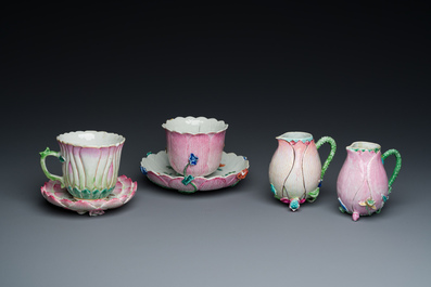 Two Chinese relief-decorated famille rose 'lotus' cups and saucers and two jugs, Yongzheng