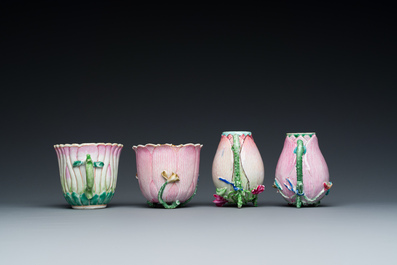 Two Chinese relief-decorated famille rose 'lotus' cups and saucers and two jugs, Yongzheng