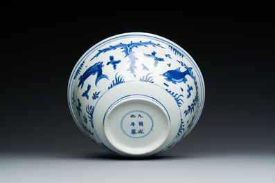A Chinese blue and white 'carps' bowl, Chenghua mark, Kangxi